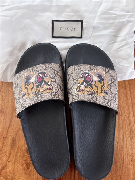 gucci slides supreme tiger|Gucci tiger slip on goat.